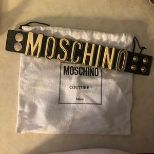 Moschino name bracelet with 4 hole enclosures to make the bracelet fit snug